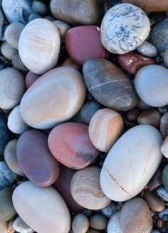 many different colored rocks on top of each other