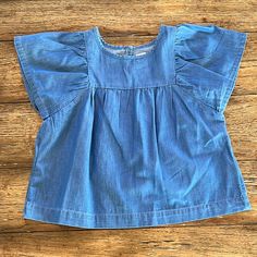 Bnwt Gap Flutter Sleeve Denim Top. Size Small 6-7. Fabric: 100 Cotton Gap Casual Tops With Flutter Sleeves, Casual Gap Tops With Flutter Sleeves, Gap Casual Flutter Sleeve Tops, Gap Ruffled Short Sleeve Tops, Indigo Short Sleeve Cotton Denim Top, Indigo Short Sleeve Denim Top, Casual Cotton Top With Butterfly Sleeves, Casual Cotton Tops With Butterfly Sleeves, Indigo Cotton Denim Top With Short Sleeves