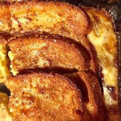 french toast with melted cheese on it in a skillet, ready to be eaten