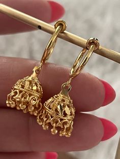 gold plated jhumki earrings on clip on hoops, Indian style clip on earrings  Earrings dangle 1.25 inches long and are super light. perfect for everyday wear.  These beauties are for non pierced ears, they are clip on style. Small Jumki Gold, Festive Gold Plated Dangle Hoop Earrings, Festive Gold Plated Hoop Earrings, Festive Dangle Hoop Earrings Gold Plated, Brass Dangle Clip-on Earrings, Elegant Gold Hoop Earrings With Latkans, Gold Clip-on Jewelry For Festive Occasions, Traditional Chandbali Clip-on Earrings, Festive Gold Clip-on Jewelry