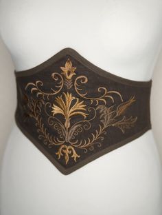 "The Spicy Garden" Do you like corsets but also like to feel comfortable in your clothes? This belt is made for you! This is an embroidered elastic waist cincher, made of quality linen. Steel bones on the front of the belt provide support and give the illusion that it is a real corset. The sturdy elastic that makes up the back of this accessory allows for greater support than a classic belt and will adapt perfectly to your waist. The embroidered pattern was created in our workshop for this uniqu Corset Embroidery, Classic Belt, Corset Belt, Embroidered Linen, Corset Lingerie, Belted Shorts, Waist Cincher, Fabric Belt, Corsets