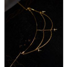 A necklace that looks like a constellation connecting stars. A design with a golden chain hanging down. Glossy stars emit a dazzling light. It has an elegant atmosphere as it sways every time you walk. A retro item with an exotic scent. 
 
 
 Item 
 
 Necklace 
 
 
 Size 
 
 Necklace decoration part 
 
 Height: 5.3cm 
 Width: 9.4cm 
 
 
 
 Material 
 
 Alloy 
 
 
 Others 
 
 If you have a metal allergy or the plating does not suit your skin, please refrain from ordering. Celestial Party Jewelry With Adjustable Chain, Gold Jewelry With Moon Charm For Party, Elegant Party Jewelry With Moon Charm, Party Crescent Moon Charm Necklace, Ethereal Gold Dangle Jewelry, Party Jewelry With Moon Charm, Elegant Star-shaped Chain Jewelry, Moon Charm Pendant Necklaces For Party, Moon Charm Pendant Necklace For Party