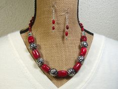 "Natural AAAGrade Quality Red Coral 7x10mm on the Necklace Straps, 16mm up to 18mm Long Coral in the Necklace Body, with .925 Silver Beading and Clasp Necklace and Earrings Handmade by me, \"Limpin' Lizard\". This Silver Hook and Eye Clasp necklace is 20\" inches long but can be made longer by using the 3\" Silver Extention Chain (chain can be removed if buyer prefers), or shortened if buyer prefers. Earrings are available with your choice of Silver French Wire Hooks (as shown), Silver Leverback Red Oval Beads Jewelry For Gift, Red Oval Beads Jewelry, Red Gemstone Beads Sterling Silver Jewelry, Red Sterling Silver Jewelry With Gemstone Beads, Red Beaded Sterling Silver Jewelry, Necklaces Red, Nice Jewelry, Beaded Jewelry Designs, Dragonfly Pendant