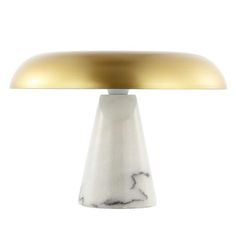 a white and gold table lamp with a marble base on an isolated white background,