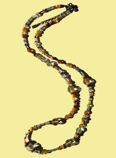 "Crystal beaded 30 inch necklace. Austrian crystal and Antique Czechoslovakian glass from our collection in shades of jonquil yellow, topaz and citrine. Many of the beads are rare and irreplaceable, originating from Czechoslovakia, Bavaria, Wattens, Kobe and Milano. Metal parts from our own tooling are antiqued bronze. \"Solaris\" is 30 inches long, handmade in the USA. Owen Glass Collection® jewelry is ready for gift giving, with an organza bag and description card included. Please let us know Topaz And Citrine, Crystal Beaded Necklace, Crystal Bead Necklace, Art Deco Glass, Art Deco Earrings, Amethyst Earrings, Austrian Crystal, Bavaria, Chandelier Earrings