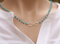 This turquoise beaded infinity necklace has: 1. a charming chain (several lengths available) made from a string of blue chalcedony (other stones available) beads wire-wrapped with sterling silver (wire, closed with a lobster clasp. 2. a sterling silver infinity charm at the center. Packaged in my shop's premium quality gift box. Elegant Turquoise Necklace With Lobster Clasp For Gift, Turquoise Cross Necklace, Boho Jewellery Necklaces, Cross Necklace Sideways, Infinity Charm, Mother Jewelry, Turquoise Cross, Gemstone Beaded Necklace, Infinity Necklace