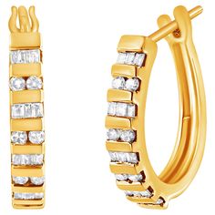 Elegant and timeless, these gorgeous 10K gold hoop earrings feature 1.0 carat total weight of baguette cut and round, brilliant cut diamonds channel set in alternating rows into the face of the oval shaped hoops. The earrings feature a whopping 60 white diamonds in all. These 10K Yellow Gold Hoop Earrings, have a high shine, polished finish and measure 1” long. The earrings feature hinged, snap down posts with notched posts and friction backs. This authentic design is crafted of real 10 karat gold, a precious metal that will keep a tarnish-free shine for years to come. These beautiful earrings make a great gift for any special occasion. Diamonds are thought to give the wearer clarity and illuminate solutions to life’s problems, as well as encouraging abundance, strength, courage, harmony, Modern Hoop Earrings, Baguette Cut Diamond, Diamond Hoop Earrings, Baguette Cut, Baguette Diamond, Belleza Natural, Jewelry Earrings Hoops, Gold Hoop, Round Brilliant Cut Diamond