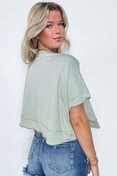 Details: This Erika Raw Edge Pocket Top is the perfect combination of edgy and practical. With raw edge detailing and a convenient pocket, you can show off your unique style while keeping your essentials close by. Stay cool and confident in this playful and versatile top. - Short sleeves - Relaxed fit Content: 100% cotton Size + Fit: Model is 5'8" and wearing a Small - Approximate measurements from a size Small - Full length: 19" - Chest: 60" - Waist: 60" - Sleeves: 12" Brand: Charlotte Avery Edgy Tops With Pockets For Fall, Edgy Fall Tops With Pockets, Trendy Washed Tops For Layering, Urban Tops For Spring Layering, Urban Fall Tops For Everyday, Edgy Spring Tops With Pockets, Trendy Washed Solid Color Tops, Chic Everyday Top With Frayed Hem, Trendy Everyday Washed Tops