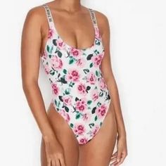 Victoria’s Secret Swim M Pink Roses Bling Straps Swimsuit One Piece With Tags 80% Polyamide 20% Elastane Underarm To Underarm 15.5” Top Of Adjustable Strap To Center Bottom 26.6” Summer Printed Loungewear Bodysuit, Summer Printed Bodysuit For Loungewear, Printed Summer Bodysuit For Loungewear, Casual Pink Bodysuit With Floral Print, Victoria's Secret One-piece Summer Bodysuit, Pink Floral Print Bodysuit For Pool, Summer Pink Bodysuit With Floral Print, Summer Victoria's Secret Lined Bodysuit, Victoria's Secret Lined Bodysuit For The Beach