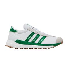 Find ADIDAS Human Made X Country 'gears For Futuristic Teenagers Green on Editorialist. The Human Made x adidas Country ‘White Green’ offers Nigo’s modernized take on the retro ‘70s silhouette. The white textile upper is fortified with tonal suede overlays and a molded TPU heel counter. ‘Gears for Futuristic Teenagers’ is inscribed on green leather three-stripes, while Human Made’s heart logo is stamped on the matching green leather heel tab. The grassy hue is repeated on a stabilization frame added to the full-length Boost midsole. Underfoot, a lugged Continental rubber outsole delivers superior grip.