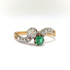 Antique Edwardian Emerald and Diamond Toi et Moi Crossover | Etsy Vintage Emerald Ring With Vvs Diamond, Vintage Emerald Ring With Vvs Clarity, Heirloom Green Diamond Ring With Single Cut Diamonds, Antique Emerald Diamond Ring With Brilliant Cut, Vintage Green Emerald Ring With Single Cut Diamonds, Heirloom Emerald Ring With Single Cut Diamonds, Heirloom Emerald Ring With Single Cut Diamonds For Anniversary, Antique Green Diamond Ring, Vintage Green Diamond Ring With Single Cut Diamonds