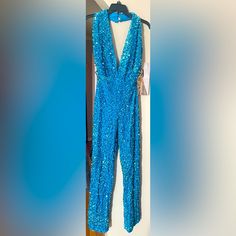 Never Worn Fashion Nova Sequined Romper. Aqua Blue In Color, Lined, Velvet. Deep Plunging Neckline, Very Sexy!! Glamorous Blue Jumpsuits And Rompers For Summer, Chic Blue Jumpsuits And Rompers For Party, Chic Blue Jumpsuit For Party, Glamorous Blue Sleeveless Jumpsuits And Rompers, Glamorous Blue Jumpsuits And Rompers For Party, Blue Glamorous Fitted Jumpsuits And Rompers, Blue V-neck Jumpsuit For Party, Blue Bottoms For Evening Party Season, Blue Evening Bottoms For Party Season