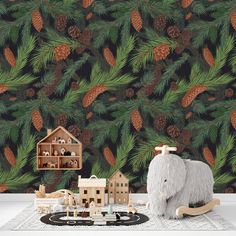 an elephant toy sitting in front of a christmas tree wallpaper