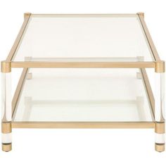 a glass and brass coffee table with two shelves