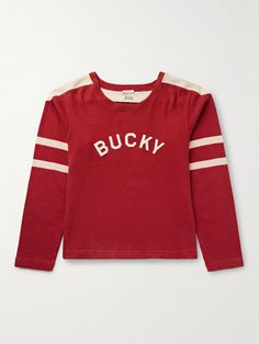 From the striped sleeves to the boxy cut, BODE's sweatshirt is modelled after a sports jersey from the 1970s. It's made from cotton-jersey and detailed with a contrasting yoke and a 'Bucky' appliqué at the front. Red Sweatshirt, Latest Sweater, Jacquard Sweater, Jersey Sweatshirt, Half Zip Sweatshirt, Sweatshirt For Men, Half Zip Sweaters, Embroidered Sweater, Striped Sleeve