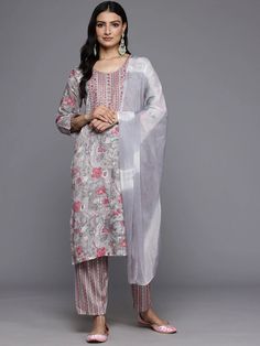 Grab this beautiful 3-piece set. The set comes with floral embroidered kurta has round neck, 3/4th sleeves & calf length teamed with printed trouser pant with elasticated waistband & slip on closure and a silk chiffon dupatta. Color - Grey Kurta Fabric-Cotton Bottom Fabric-Cotton Dupatta Fabric - Silk Chiffon Neck-Round Neck Sleeves-3/4th Sleeves Work - Print & Embroidery Detailing Washing Instructions-Hand Wash DISCLAIMER - The color of the product may be differ due to screen settings of device. A misprint here and a color drop slip there is the beauty of printing which is not treated as a defect. Grey Kurta, Embroidered Suit, Formal Jewelry, Print Embroidery, Embroidery Detailing, Cotton Dupatta, Chiffon Dupatta, Viscose Rayon, Cotton Bottoms