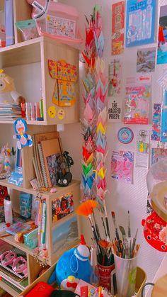 a room filled with lots of crafting supplies and craftstuffs on the wall