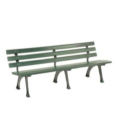 a green park bench sitting in front of a white wall