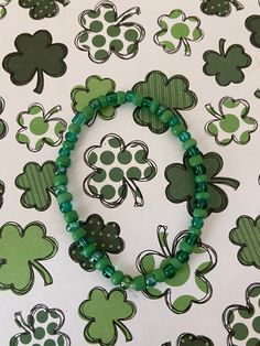 This is a St Patrick seed bead bracelet.  It would make a cute gift for a little girl for St Patrick's Day. It would make a great way to show your St Patrick's Day spirit. It has light and dark green seed beads. It was made with .8mm sturdy stretch string. I tie it several times to prevent breakage. It fits girls ages 4-7. It stretches to fit on the wrist. All items are ready to be shipped I do combined shipping. Items ship in 2-5 business days. Check out more items at: http://www.etsy.com/shop/ Bracelets For Kids, Bracelets For Girls, Seed Bead Bracelet, Seed Bead Bracelets, St Patrick’s Day, Cute Gift, Fit Girl, Bead Bracelet, Seed Bead