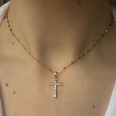 The Angel Necklace 🤍 Featuring a unique gold cross with sparkly CZ crystals and an 18k gold filled chain. tarnish resistant 🖤 each will come with an extender for adjustability! Made with love 🫶 Crystal Cross Chain Jewelry, Crystal Cross Jewelry With Chain, Gold Cross Crystal Necklace, Gold Crystal Cross Necklace, Gold Cross Necklace With Crystal, Crystal Cross Jewelry With Adjustable Chain, Dainty Gold Rhinestone Jewelry, Gold Cross Pendant Necklace With Rhinestones, Crystal Cross Necklace With Adjustable Chain