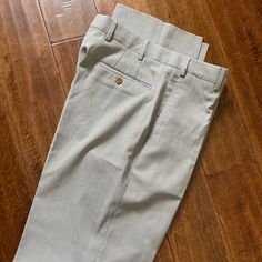 Zanella Dress Pants. Size 33 Never Worn. Light Beige Pin Stripes. Khaki Fitted Full-length Bottoms, Fitted Full-length Khaki Bottoms, Fitted Full Length Khaki Bottoms, Classic Full Length Dress Pants For Summer, Fitted Khaki Long Pants, Fitted Wide Leg Khaki Bottoms, Beige Slim Fit Trousers, Elegant Full-length Chinos For Spring, Elegant Full Length Chinos For Spring