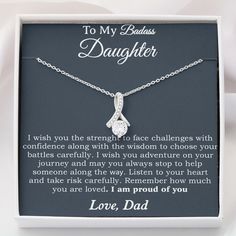 ♥ Surprise Your Daughter with this beautiful necklace and melt her heart! She's worth it! "To My Badass Daughter Necklace From Dad, Badass Daughter Necklace Birthday Gift " Alluring Beauty Necklace Details: - This beautiful pendant is truly a one-of-a-kind gift for yourself or a loved one - Crafted with 14k White Gold over Stainless Steel - The adjustable oblate cable chain allows the necklace to be worn at 18" to 22" in length - Product Dimensions: Height: 0.8" (20mm) x Width: 0.4" (10mm) with 7mm cubic zirconia - Free luxury gift box with Message Card! This Jewelry Item Is the Perfect Keepsake! Whether for Yourself or a Loved One. Gift Occasion: Great For Birthday Gifts, Valentine's Day, Christmas Gifts, Xmas Season, Saint Patrick Day, Mothers Day, Fathers Day, Grandparents Day, Annivers Valentine's Day Birthstone Necklace With Meaningful Style, Valentine's Day Meaningful Birthstone Necklace, Valentine's Day Birthstone Necklace, Inspirational Jewelry For Birthday Gift On Valentine's Day, Silver Necklace For Valentine's Day With Gift Box, Inspirational Jewelry Gift With Box, Inspirational Jewelry With Gift Box, Inspirational Necklaces For Birthday And Valentine's Day, Meaningful Birthstone Jewelry For Birthday Gift