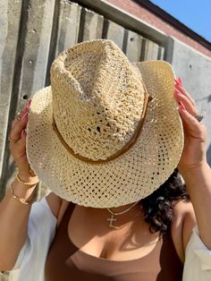 Western style straw hat with adjustable tie. Adjustable Braided Fedora, Adjustable Braided Fedora Hat, Casual Braided Straw Fedora, Adjustable Country Style Fedora Sun Hat, Adjustable Braided Straw Boater Hat, Casual Braided Boater Hat, Casual Adjustable Braided Boater Hat, Adjustable Straw Hat With Curved Brim For Country Events, Casual Straw Hat For Day Out