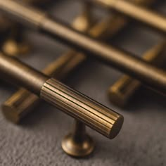 brass handles and knobs on the back of an instrument