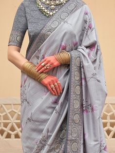 This stunning saree features delicate floral print work and intricate zari weaving, showcasing the exceptional craftsmanship of skilled artisans. Measuring 5.50 meters, it comes with an unstitched blouse material, allowing for a personalized fit that enhances your individual style. The vibrant grey color, complemented by the colorful floral patterns, ensures this saree is a standout choice for any special occasion, be it weddings, festivals, or celebratory gatherings.
Accompanying the saree is a Engagement Gown, Lehenga Crop Top, Lehenga Choli Wedding, Floral Lehenga, Party Wear Lehenga Choli, Reception Gown, Bollywood Lehenga, Cocktail Wear, Party Wear Lehenga