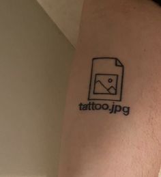 a tattoo that says tattoo jpg on the side of a person's leg