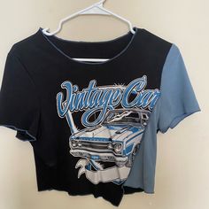 Vintage Two Toned T-Shirt Best For Xs-Small New With Tags Pair With Black Jeans And A Leather Jacket!! Black Y2k T-shirt For Spring, Black Slogan Cropped T-shirt For Streetwear, Black Slogan Crop Top T-shirt, Blue Graphic Print Crop Top T-shirt, Grunge Cropped T-shirt With Graphic Print, Black Y2k Cropped T-shirt For Spring, Grunge Crew Neck Tops With Graphic Print, Edgy Crew Neck Top With Graphic Print, Black Y2k Crew Neck Top