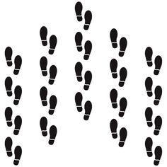 a group of footprints that are in the middle of a line on a white background