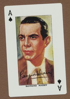 a close up of a playing card with an image of a man in a suit