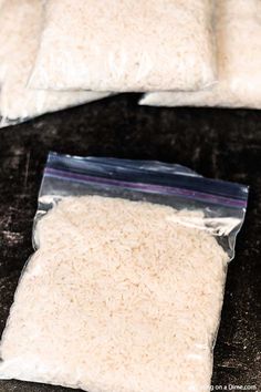 two bags of rice sitting on top of a counter