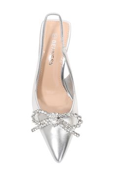 A dramatic pointy-toe and crystal-embellished bow add dramatic style to this sleek slingback pump. Synthetic upper, lining and sole Imported Glamorous Synthetic Slingback Pumps For Formal Occasions, Glamorous Synthetic Slingback Pumps For Formal Events, Glamorous Formal Synthetic Slingback Pumps, Glamorous Slingback Pumps With Bow And Pointed Toe, Glamorous Pointed Toe Slingback Pumps With Bow, Glamorous Party Slingback Pumps With Bow, Glamorous Synthetic Slingback Pumps For Party, Glamorous Slingback Pumps With Bow, Dramatic Style