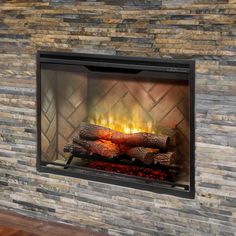 a fireplace with logs burning in it