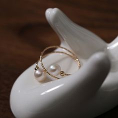 Product Details Process: 14K gold-filled Material: Natural Pearl (5.5-6mm) Size: ring height 1.3cm Weight: about 1g Real Pearl Jewellery, Gold Wrap Ring, Gold Pearl Ring, Freshwater Pearl Ring, Natural Pearl, Gold Plated Rings, Unique Gemstones, 925 Silver Jewelry, Swarovski Pearls