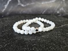 Genuine Moonstone Jewelry, Grade A 6MM Beads, Stretch Gemstone Bracelet, Custom Sized Beaded Bracelet, Beautiful Crystal Gift by AngieGJewelry on Etsy Moonstone Gemstone Beads Bracelets For Meditation, Moonstone Beaded Bracelets For Meditation, Elegant Moonstone Bracelets For Meditation, Minimalist Round Beads Bracelets For Meditation, Silver Moonstone Meditation Bracelet, White Polished Beads Bracelets As Gift, Minimalist Moonstone Bracelets With Round Beads, Minimalist Moonstone Bracelet With Round Beads, Spiritual Hypoallergenic Pearl Bracelet With Round Beads