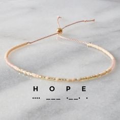 Hope Morse Code String Bracelet | Handmade by Libby & Smee Handmade String Bracelets, Mom Earrings, Best Gifts For Mom, Morse Code Bracelet, Morse Code, Silk Cord, String Bracelet, The Hope, Bracelet Handmade