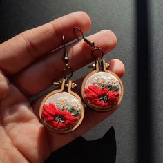 Enhance your style with these exquisite handmade embroidered floral earrings. Each pair is a unique work of art, meticulously crafted with love and attention to detail. Delicate blossoms and intricate petals come to life through the art of embroidery, creating a stunning accessory that celebrates the beauty of nature. These floral earrings are designed to add a touch of elegance and femininity to any outfit. The vibrant threads dance across the fabric, capturing the essence of blooming flowers i Traditional Embroidered Drop Earrings, Bohemian Beaded Flower Earrings, Embroidered Drop Earrings As Gift, Embroidered Drop Earrings For Gift, Bohemian Floral Embroidery Earrings For Gifts, Bohemian Floral Embroidered Earrings As Gift, Floral Embroidered Flower Jewelry For Weddings, Fall Earrings, Art Unique