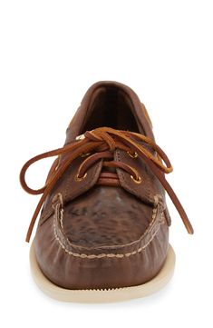 This latest iteration of the brand's Americana deck shoe features a lower profile and is shaped from vegetable-tanned leather that's custom painted on the vamp. Lace-up style Leather upper and lining/rubber sole Imported Designer Shoes Asian & Pacific Islander Owned/Founded Brown Low-top Boat Shoes, Brown Low-top Boat Shoes With Leather Sole, Leather Boat Shoes With Round Toe, Leather Lace-up Boat Shoes With Leather Sole, Classic Leather Low-top Boat Shoes, Low-top Leather Boat Shoes, Rugged Leather Boat Shoes With Leather Sole, Rugged Boat Shoes With Leather Sole And Round Toe, Leather Lace-up Boat Shoes With Rubber Sole