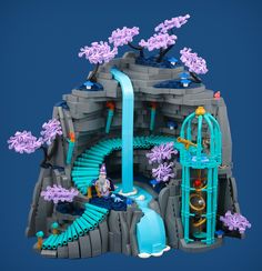 this is an image of a lego castle with waterfall and water fall in the middle