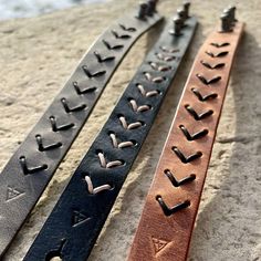 This gender-neutral bracelet is made from a half-inch wide, hand-cut band of genuine vegetable-tanned leather. Carved down the middle and laced-up in an X design with a contrasting leather cord. Adjustable from 7-8.25” to fit most wrists. Looking for the same laced design but in a wider cuff? Check out the Bolt Leather Cuff here! For more in the EDGE Collection visit this page: EDGE COLLECTION. Have a small wrist? Contact me at hello@byjillhubbard.com and I’ll customize a fit that’s just right f Leather Strap Bracelet, Leather Bracelet Patterns, Handmade Leather Bracelet, Scrap Leather Projects, Leather Bracelet Ideas, Small Leather Projects, Leather Lace Bracelet, Leather Bracelet Diy, Upcycled Leather Jacket