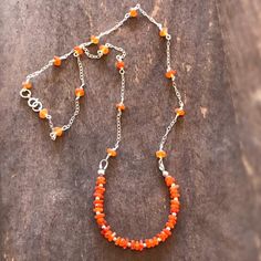 This necklace is made of carnelian gemstones, sterling silver: chain, spring ring clasp and findings. This necklace measures 18 inches in length. All of our jewelry is unique and custom designed. Most of our jewelry can easily be resized. If there is a piece of jewelry that you are interested in, but would like some changes made, please do not hesitate to contact us. We appreciate your shopping with Jewelry by CARMAL and hope you will do so often! Please see other items in our shop: http://www.j Necklace Orange, Carnelian Necklace, Silver Jewelry Fashion, Gemstone Jewellery, Sterling Silver Chain, Spring Rings, Sterling Silver Jewelry, Gemstone Jewelry, Silver Chain