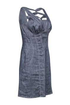 Get ready for summer with this sleeveless sheath style by Etcetera. This corset-like design features contrast stitching with front pockets for a fun take on a denim dress. Perfect on its own for the summer heat or worn in the fall with a fitted long sleeve tee underneath. Size 8 Shell 52% Linen, 45% Cotton, 3% Elastane Lining 94% Polyester, 6% Spandex Sheath silhouette Corset style bodice Contrast stitching Open back Concealed side zipper Bust 36" Waist 32" Shoulder to hem 35.25" Chic Fitted Denim Dress With Back Zipper, Elegant Sleeveless Denim Dress For Summer, Elegant Sleeveless Summer Denim Dress, Fitted Denim Dress With Back Zipper, Sleeveless Denim Dress For Summer Workwear, Fitted Denim Dress With Back Zipper For Spring, Chic Spring Dress With Seam Detailing, Chic Summer Denim Dress With Back Zipper, Fitted Summer Dress With Seam Detailing