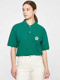 Editor's NotesThis essential polo shirt is simply accented with a dense embroidery of signature flower motif and easily goes with any bottoms. It's cut from soft touch cotton and poly-blend pique.- Polo collar- Half placket with button fastenings- Graphic embroidery on the chest- Drop shoulder- Short sleeves- Relaxed fit- Unisex wear- Minimize distortion after washingMeasurements (in.)S / M / L- Total Length: 28.0 in. / 29.5 in. / 31.1 in.- Shoulder: 19.3 in. / 20.5 in. / 21.3 in.- Chest: 20.9 in. / 22.0 in. / 22.8 in.- Sleeve Length: 8.3 in. / 8.7 in. / 9.1 in.Model Info:- Man: 5' 10.1, 143.3 lbs / Fitting size L- Woman: 5' 5, 112.4 lbs / Fitting size SComposition & Care- 80% Cotton, 20% Polyester (20's)- Recommend separate wash at low temperature water using neutral detergent or dry Green Collared Cotton Polo Shirt, Green Cotton Collared Polo Shirt, Green Relaxed Fit Polo Shirt, Green Cotton Polo Shirt With Collared Neckline, Casual Embroidered Polo Collar Top, Casual Embroidered Cotton Polo Shirt, Embroidered Cotton Polo Collar Tops, Casual Cotton Embroidered Polo Shirt, Classic Cotton Tops With Floral Embroidery