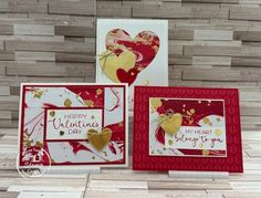 two valentine's day cards, one with hearts and the other with gold foil