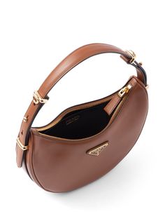 Prada Arqué Leather Shoulder Bag - Farfetch Prada Arque Bag, Designer Shoulder Bag, Round Purse, Prada Shoulder Bag, Handbag Essentials, Brown Shoulder Bag, Round Bag, Brown Handbag, Designer Shoulder Bags