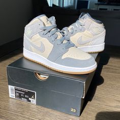 New And Never Worn -Big Kid Size 3.5y (5 In Woman’s) -Comes With Cream Laces And Box* - Style # Dn4346100 The Air Jordan 1 Mid Cream Grey Features A Cream Canvas Base That Is Then Complimented With Grey Overlays. Both The Branding On The Tongue And The Nike Symbol Shown On The Side Of The Shoe Are Featured In Grey As Well. At The Bottom, You Will Find A White Midsole And A Gum Rubber Outsole. Nike Jordan Low-top Gray Shoes, Casual Nike Jordan Shoes In Gray, Casual Gray Nike Jordan Shoes, Nike Jordan High-top Shoes In Gray, Nike Jordan Shoes In Gray Lace-up, Gray Basketball Shoes With Speckled Midsole, Nike Gray High-top Sneakers With Round Toe, Gray High-top Custom Sneakers With Speckled Midsole, Gray High-top Sneakers With Gum Sole