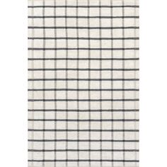 a white rug with black and grey checkered pattern on the front, side view